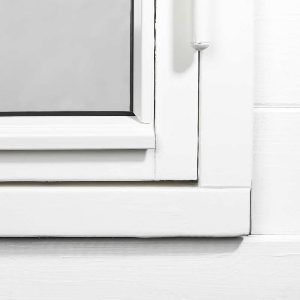 Hvide Primo glaslister på vindue