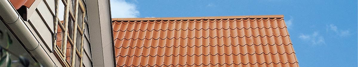 Tagrenovering med røde B5 bølgeplader