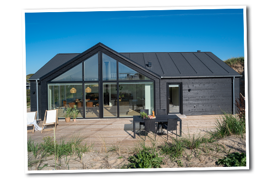 Sommerhus med facader i Supwerwood